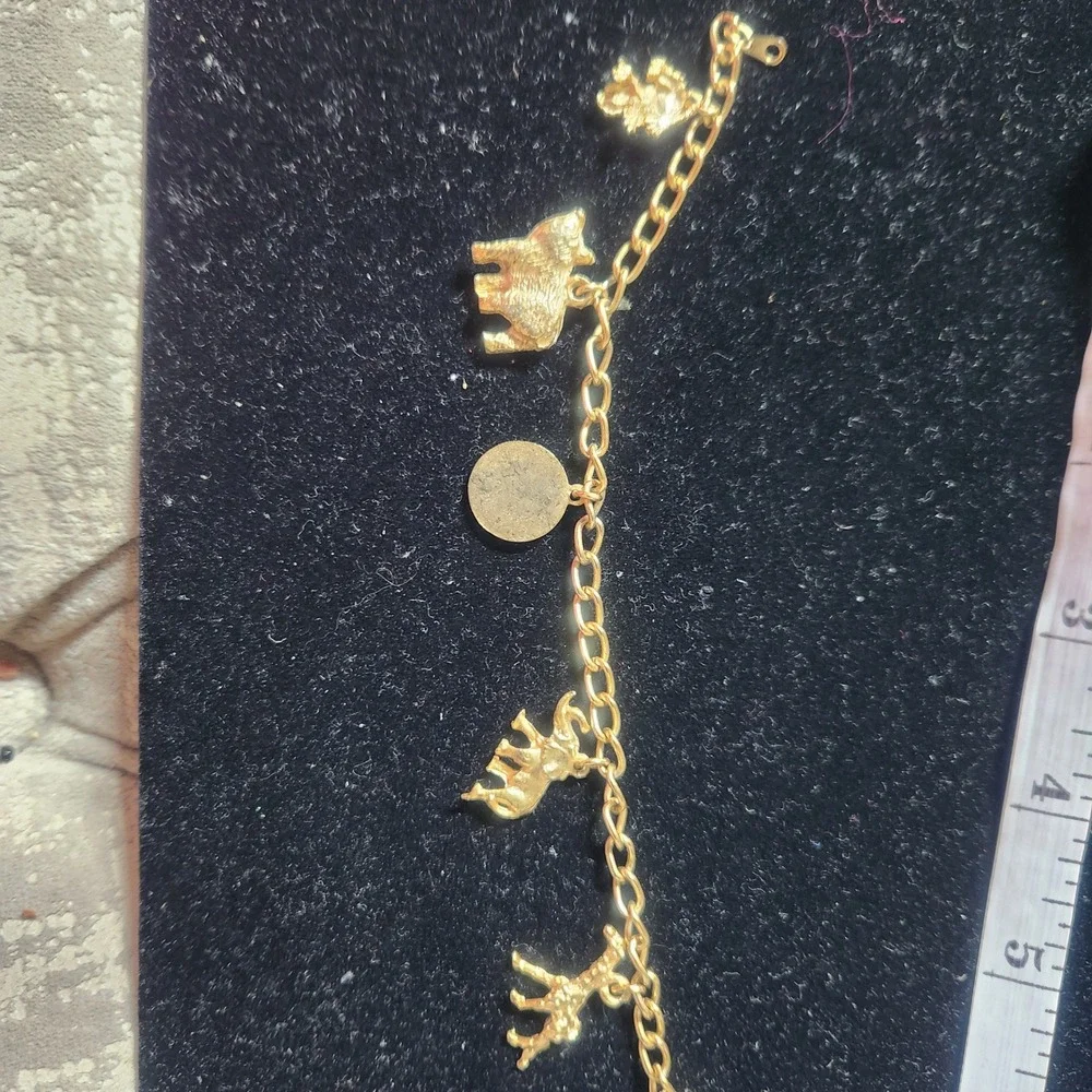 Vintage North Carolina Zoo Gold Tone Animal Charm Bracelet Giraffe Elephant Bear